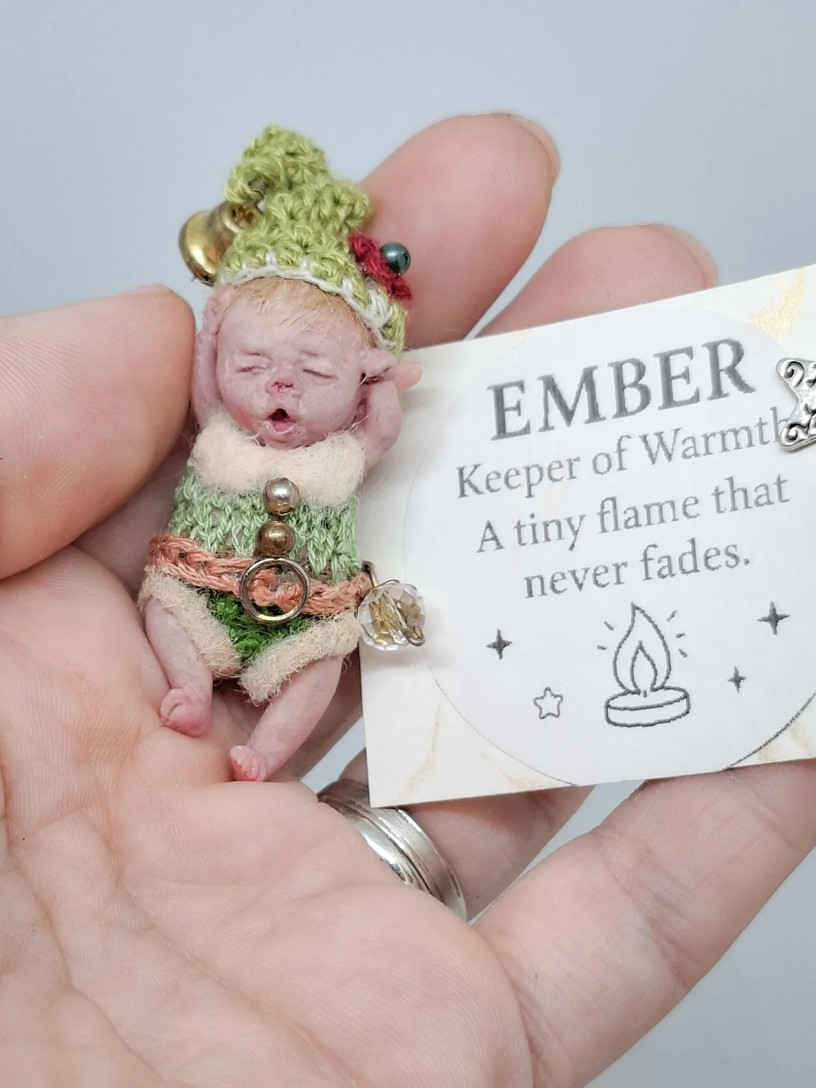 Limited edition resin micro art doll Ember, Lightkeeper of Warmth. Hand-painted 1:12 scale miniature collectible with warm tones.