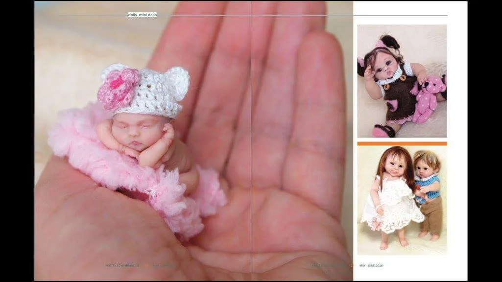 Sleeping OOAK miniature baby doll in pink crocheted outfit and bonnet with lace details, displayed with printed photos in background - by Mini Baby Dolls